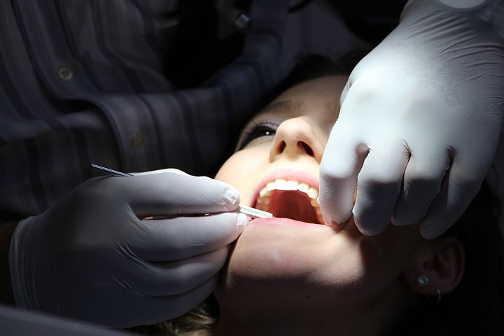 woman seeing a cosmetic dentist